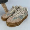 Sneaker met stiksels arrow gold (24039)