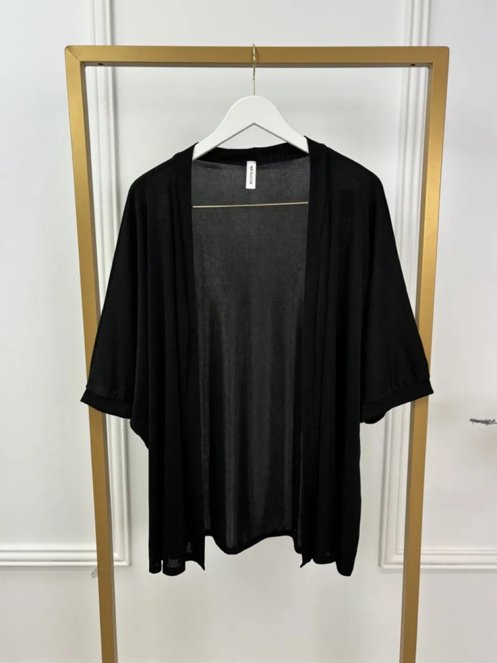 soepel_vallend_glans_vest_0-2.webp Soepel vallend glans vest met vleermuis mouw zwart