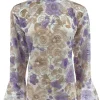 Top van kant met trompet mouw en BLOEMEN lila
